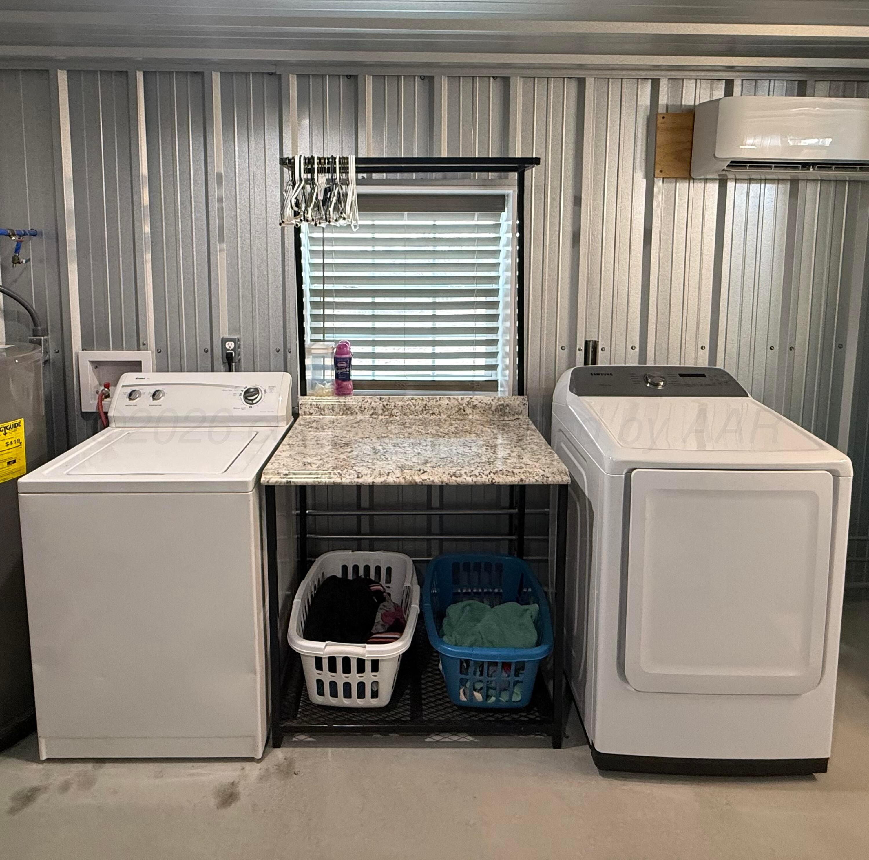 222 Bass Avenue Howardwick, TX 79226 - Photo 28 of 47 a utility room with dryer and washer