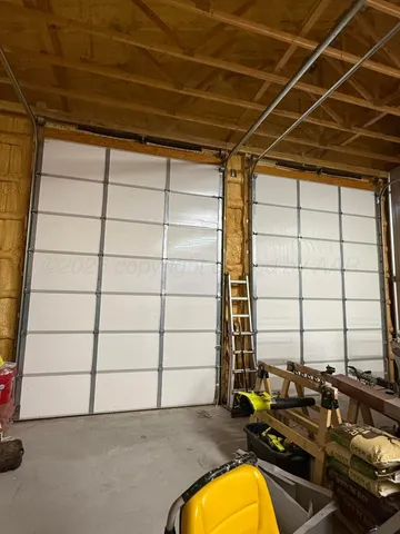 a street view with large trees