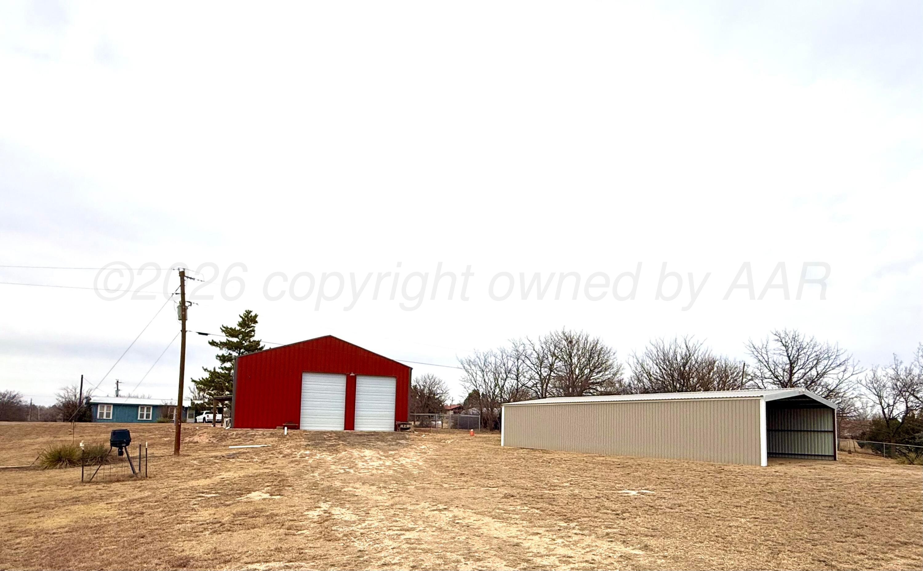 222 Bass Avenue Howardwick, TX 79226 - Photo 6 of 47 a view of a terrace with a bench