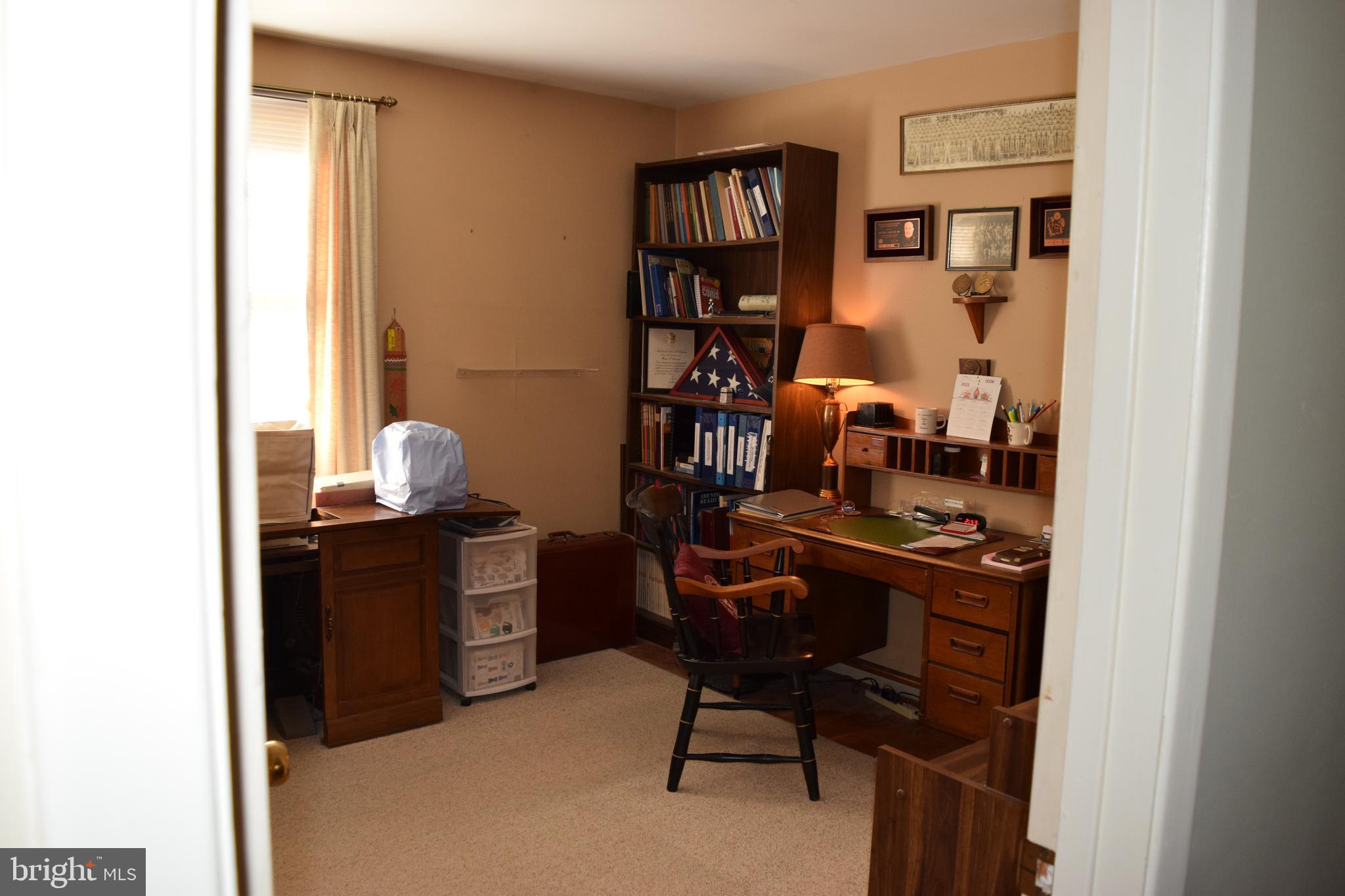 311 Radstock Road Catonsville, MD 21228 - Photo 13 of 21 a view of a workspace with furniture