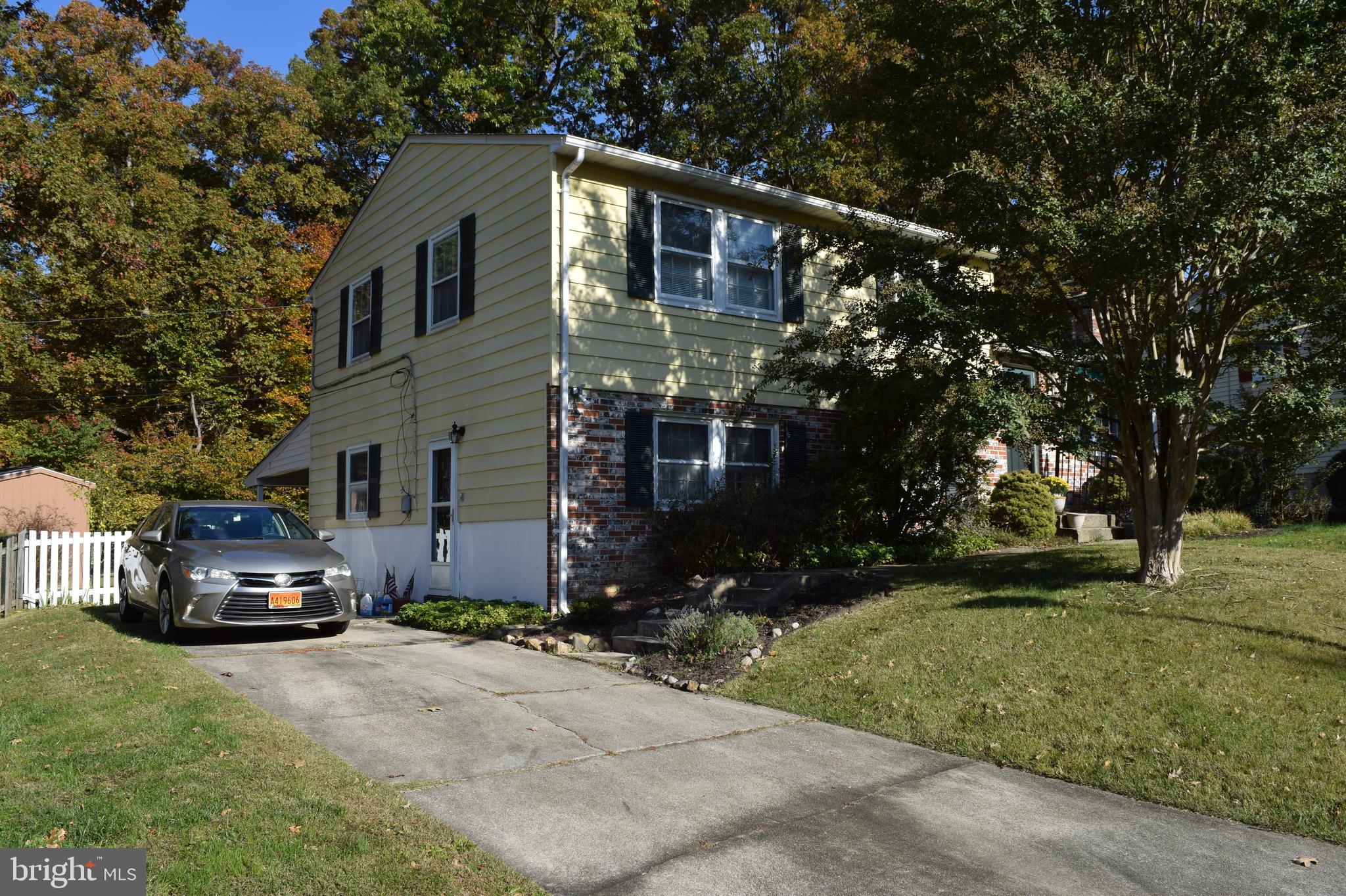 311 Radstock Road Catonsville, MD 21228 - Photo 16 of 21 a car parked in front of a house