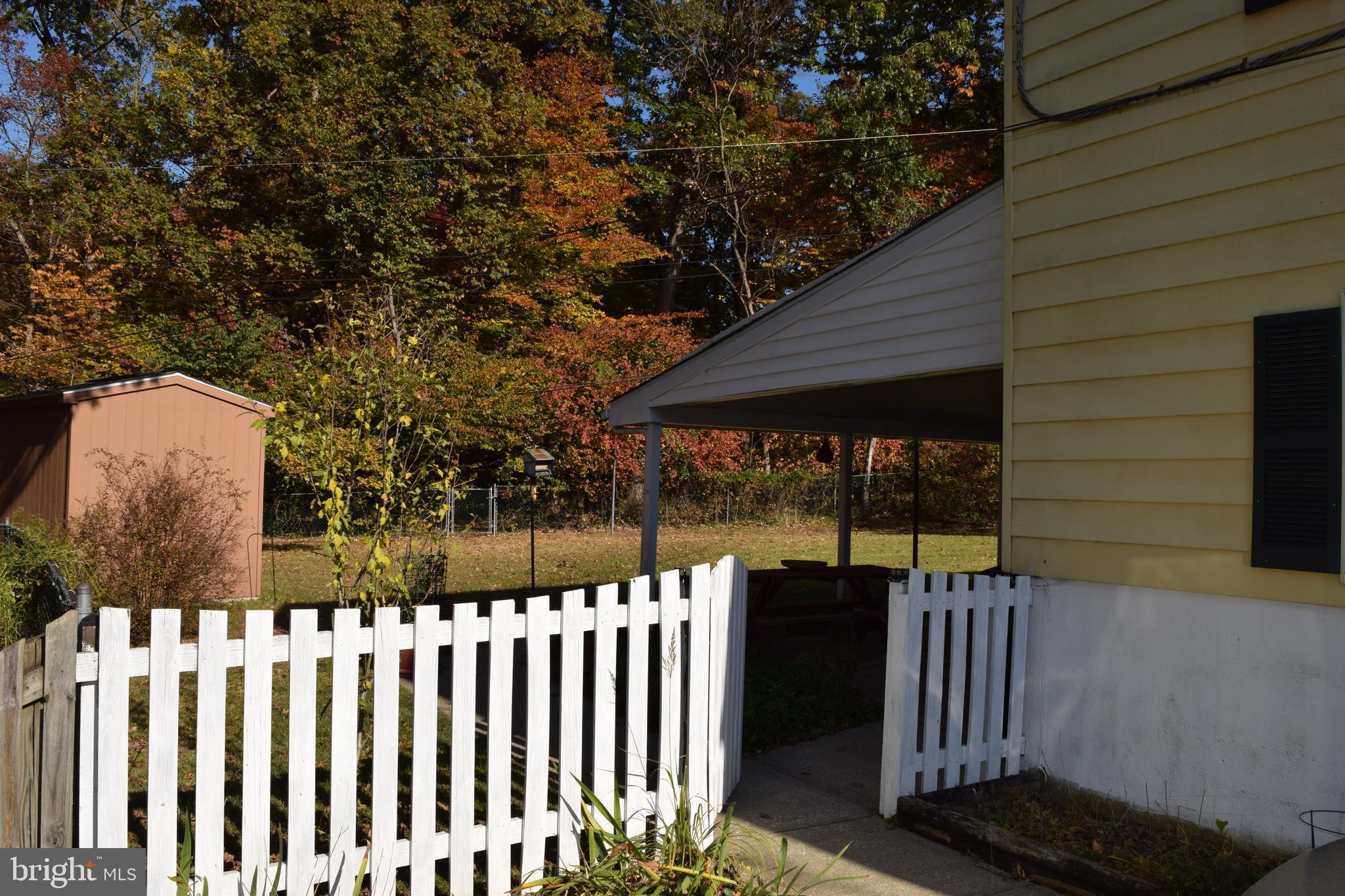 311 Radstock Road Catonsville, MD 21228 - Photo 17 of 21 a front view of a house having yard