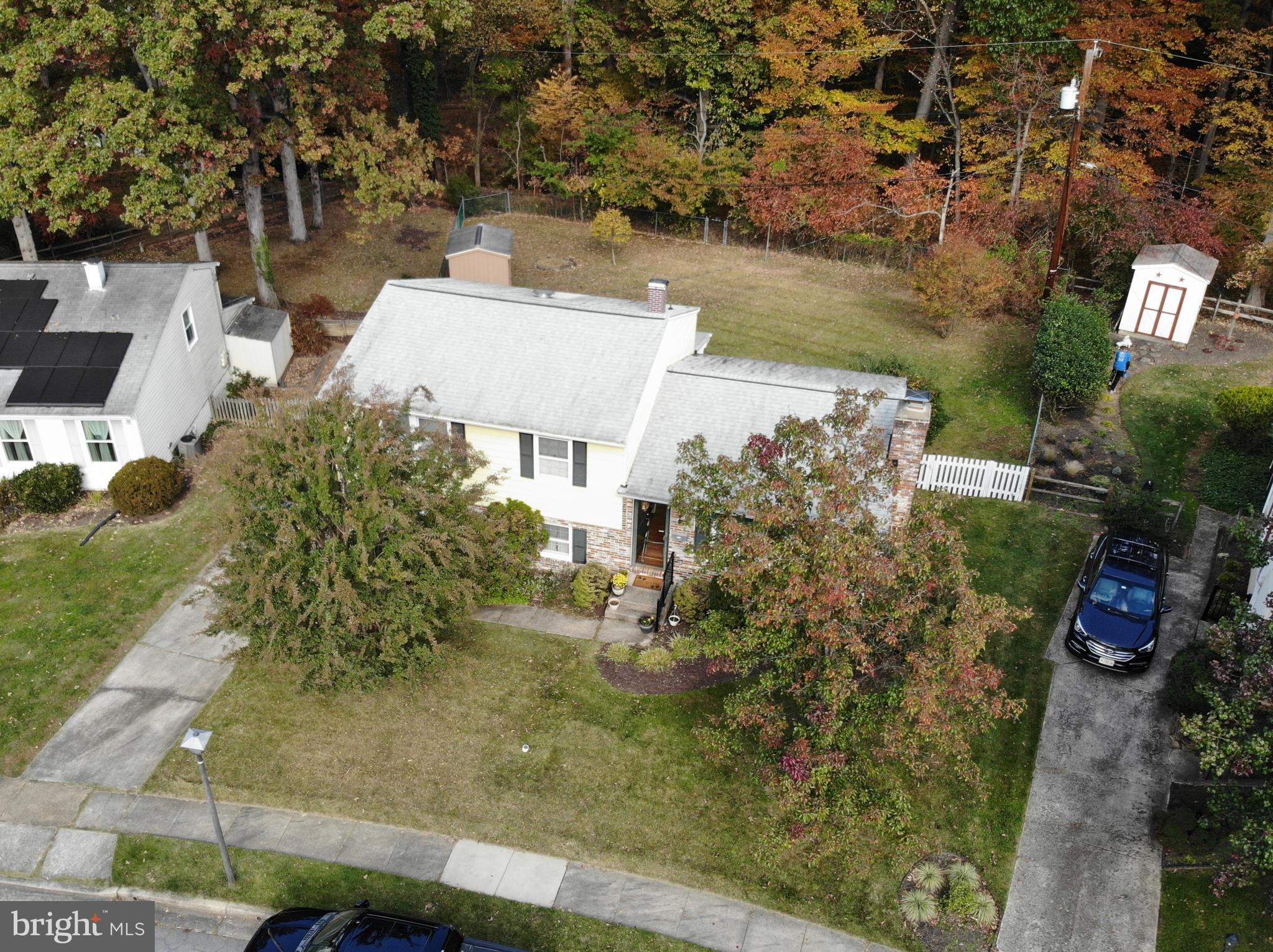 311 Radstock Road Catonsville, MD 21228 - Photo 21 of 21 an aerial view of a house with a yard and lake view