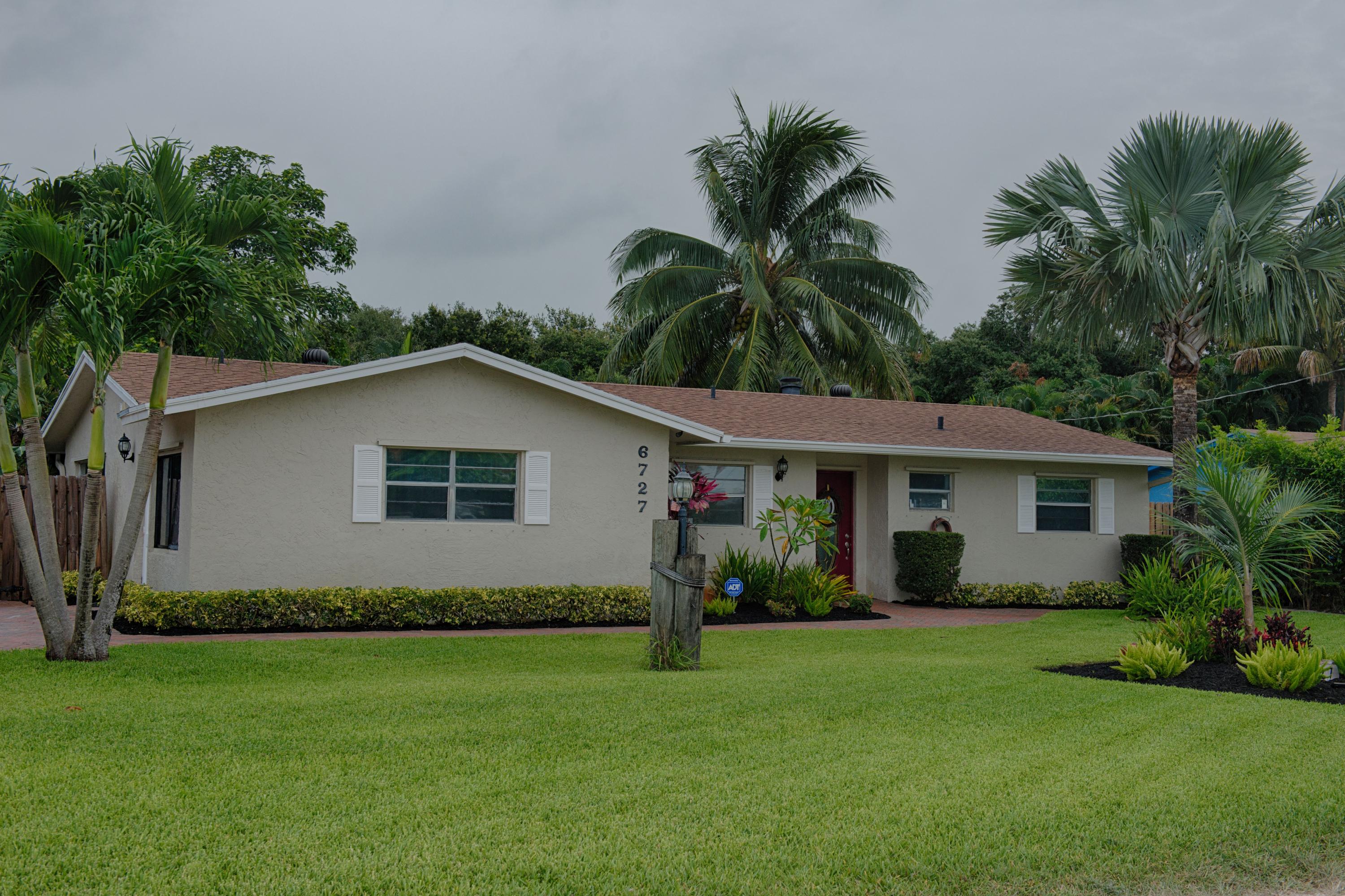 6727 Rigger Road Lake Worth, FL 33462 - Photo 1 of 14 Front3