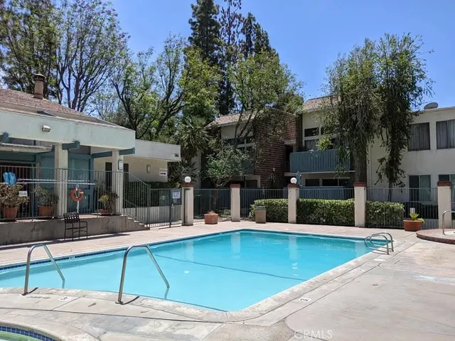 a view of outdoor space and swimming pool