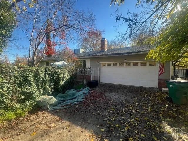 a house view with a backyard
