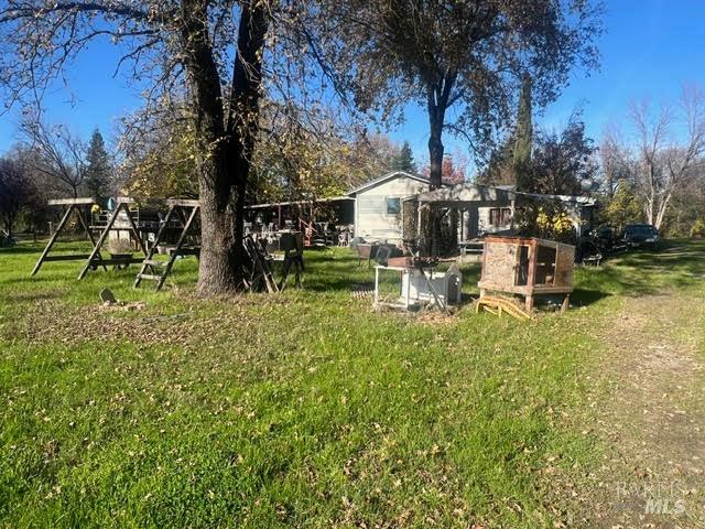 10680 Swede Creek Road Palo Cedro, CA 96073 - Photo 11 of 15 a view of a park with large trees