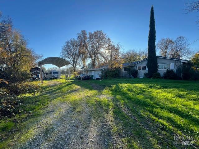 10680 Swede Creek Road Palo Cedro, CA 96073 - Photo 3 of 15 a view of a yard with a house