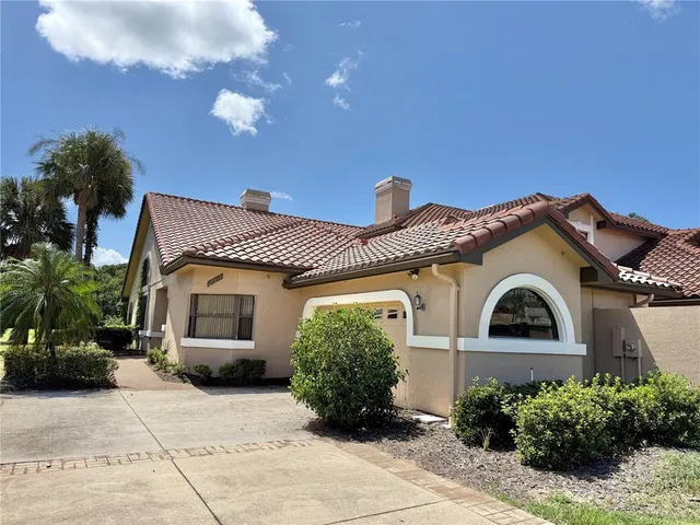 a house view with a garden space