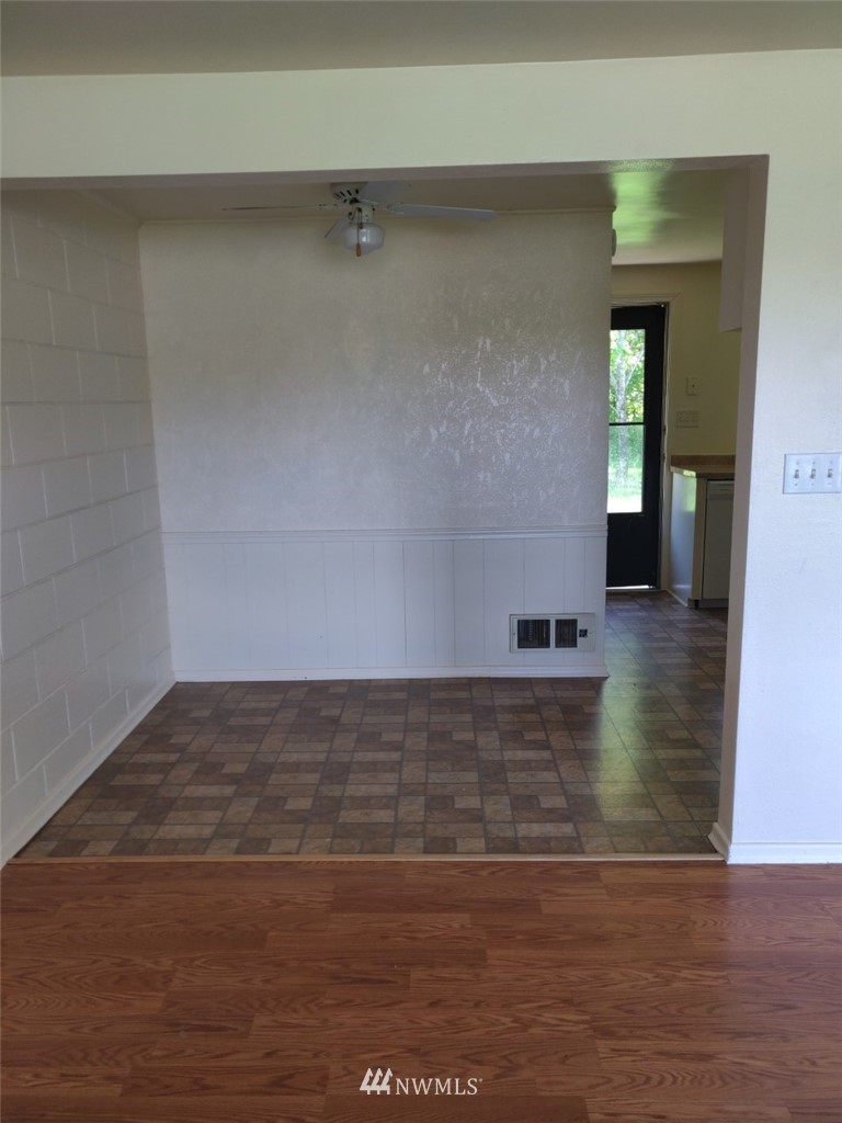 592 Southwest 18th Street Chehalis, WA 98532 - Photo 5 of 12 a view of hallway with wooden floor