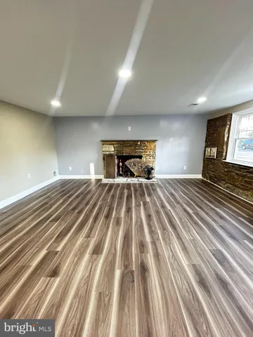 an empty room with kitchen