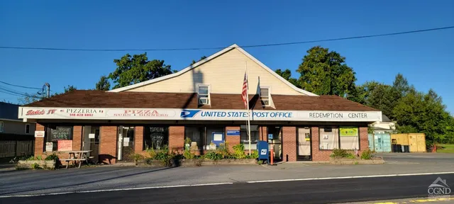 a view of a food mall next to a road