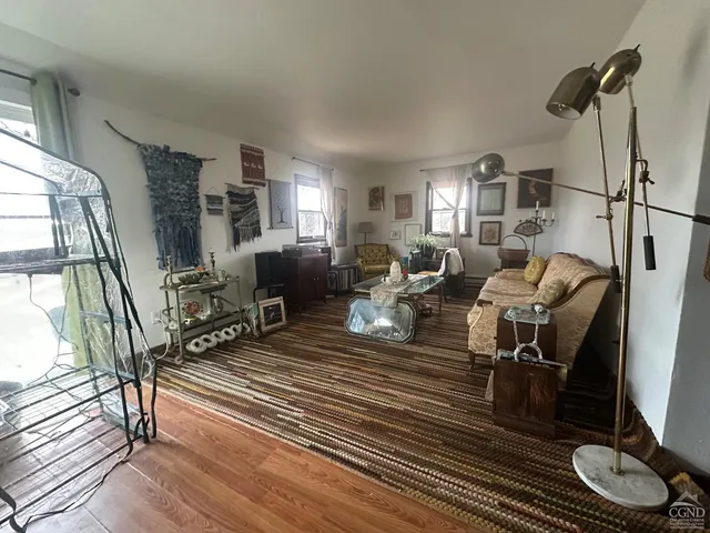 a kitchen with a sink a stove and cabinets