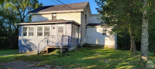 front view of house with a yard