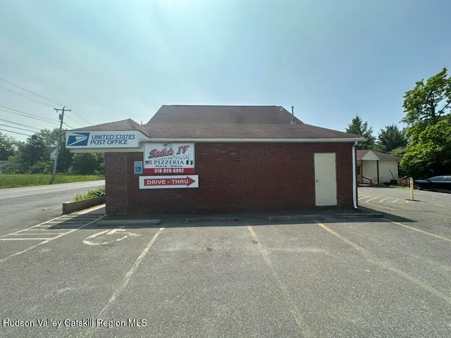 a view of a house with a garage