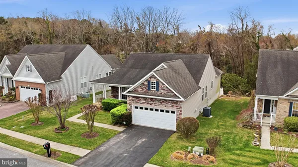 an aerial view of a house with garden