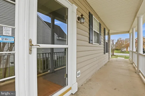 a view of a porch of a house