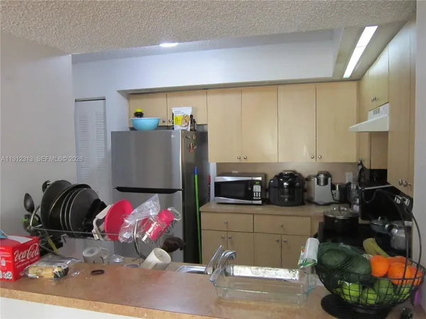 a room with a couch and a gym equipment