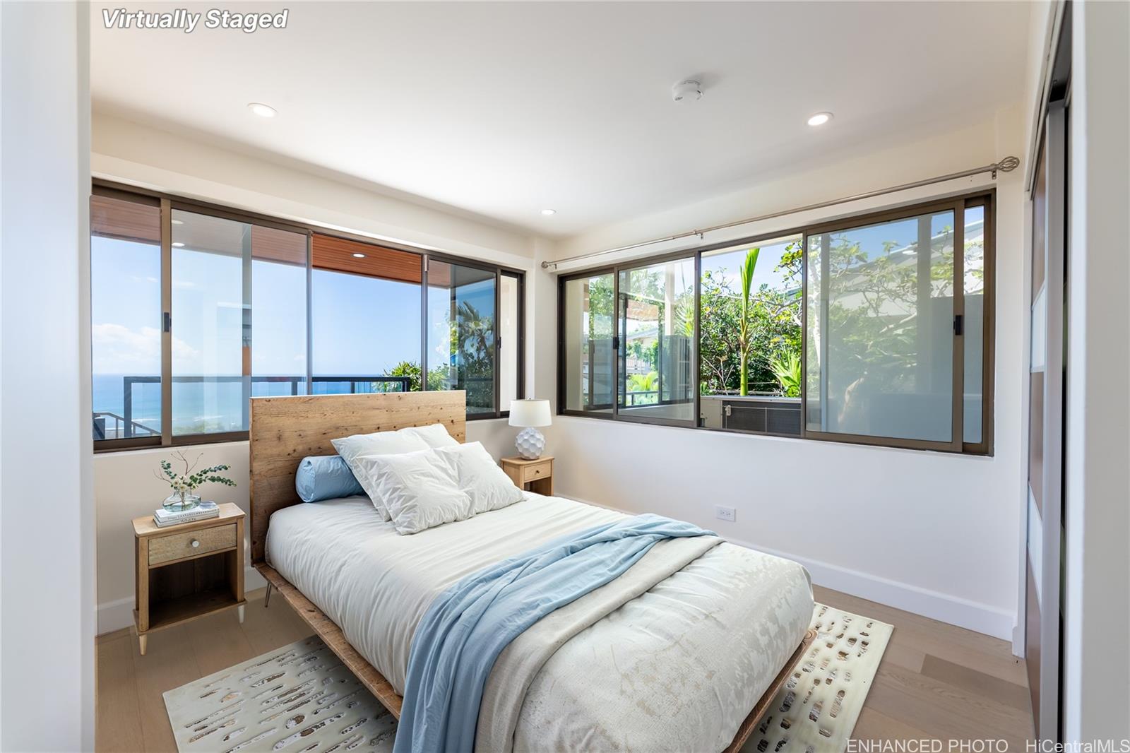 1632 Ihiloa Loop Honolulu, HI 96821 - Photo 19 of 24 a bedroom with a large bed and a large window