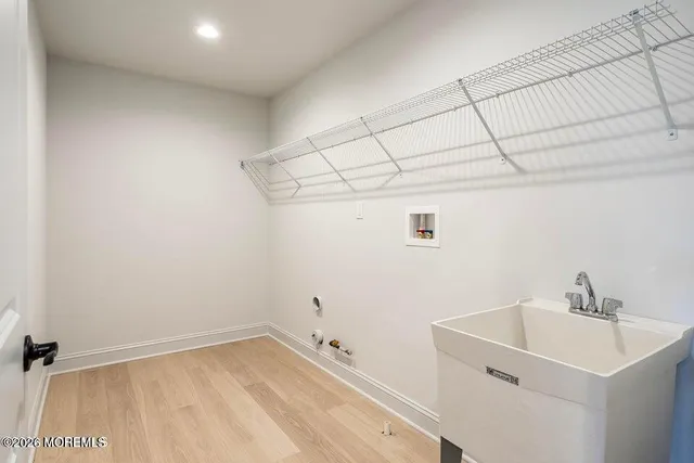 a bathroom with a sink and vanity