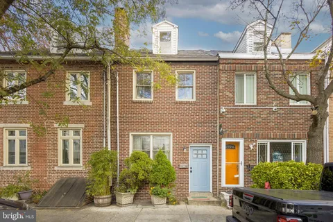 front view of a house with a street