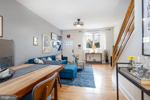 a bedroom with furniture and a chandelier