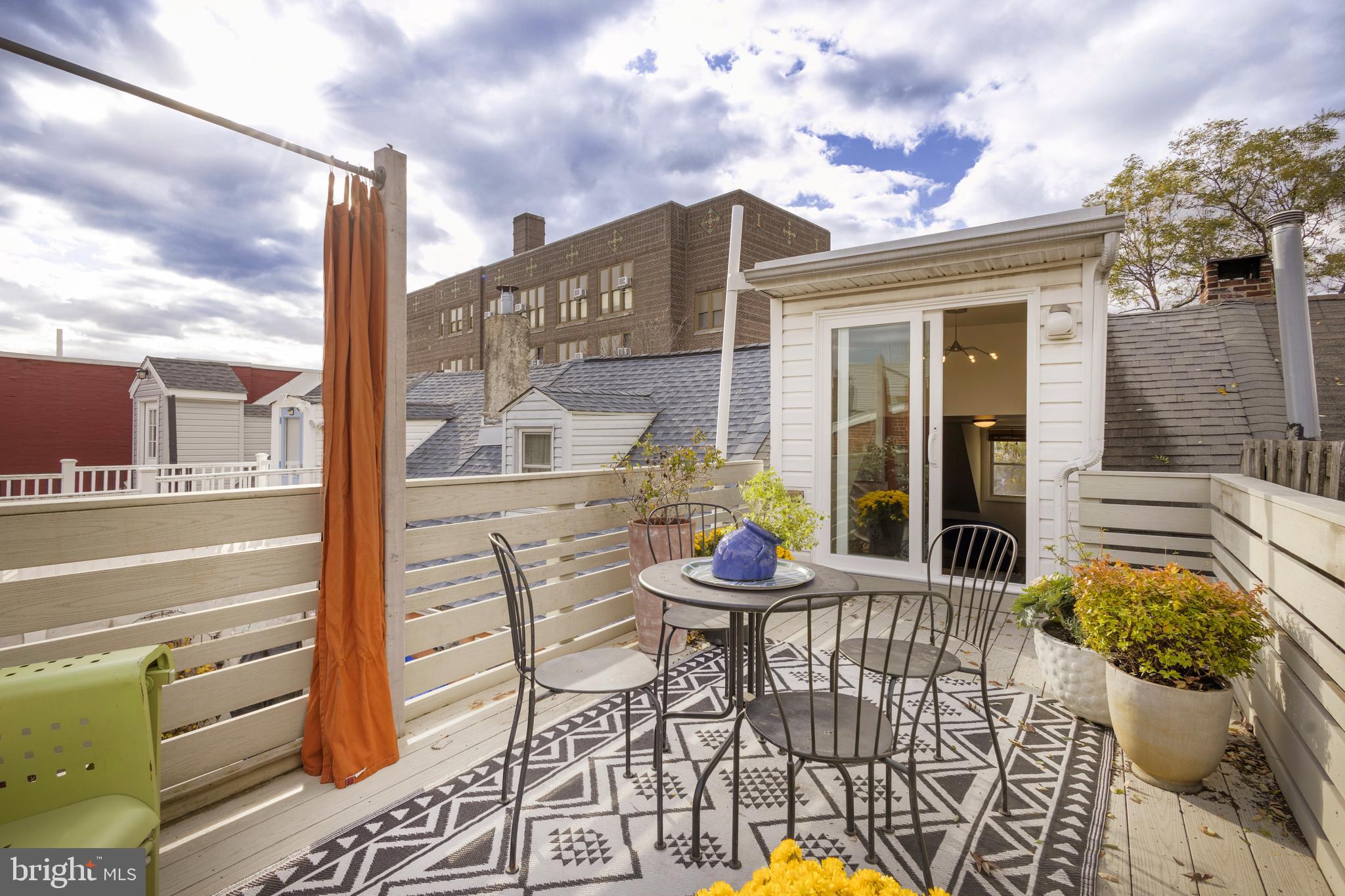 929 South 6th Street Philadelphia, PA 19147 - Photo 24 of 28 a view of a patio with table and chairs and potted plants
