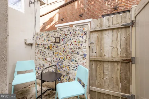 a view of a chair and table in a room