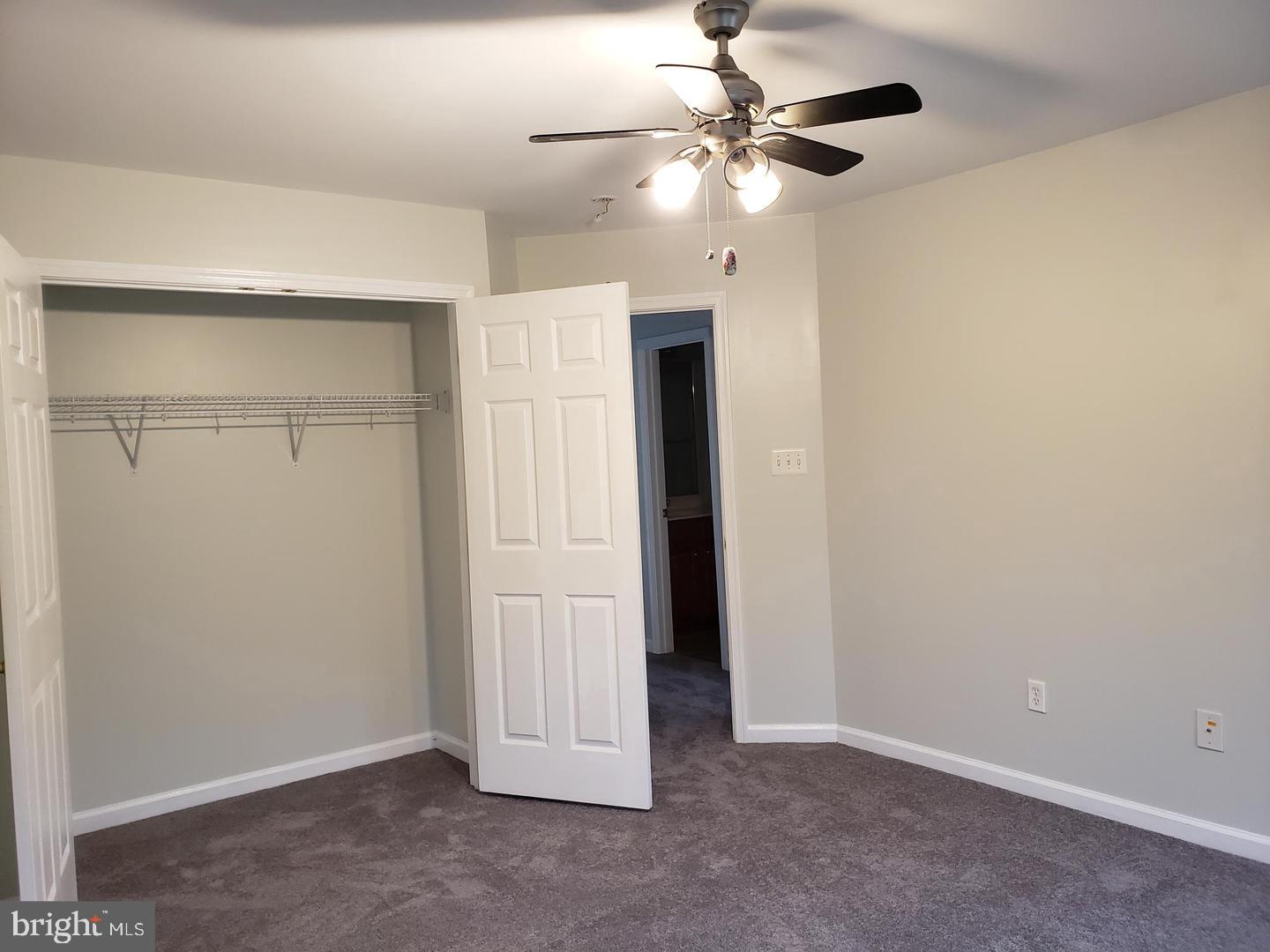 43967 Peony Place California, MD 20619 - Photo 18 of 27 an empty room with a ceiling fan and a fan
