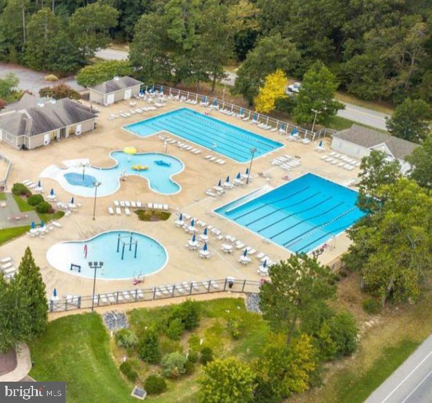 43967 Peony Place California, MD 20619 - Photo 23 of 27 a view of a swimming pool with a yard