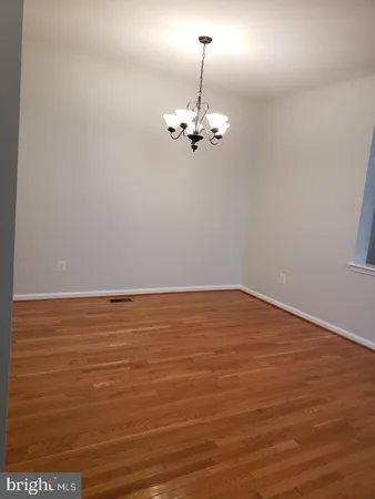 a view of a room with an empty space