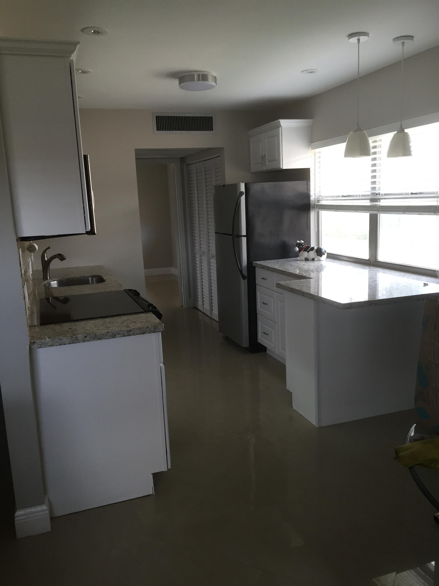 611 Monaco Way, Unit 611 Delray Beach, FL 33446 - Photo 12 of 25 Kitchen with Large work area
