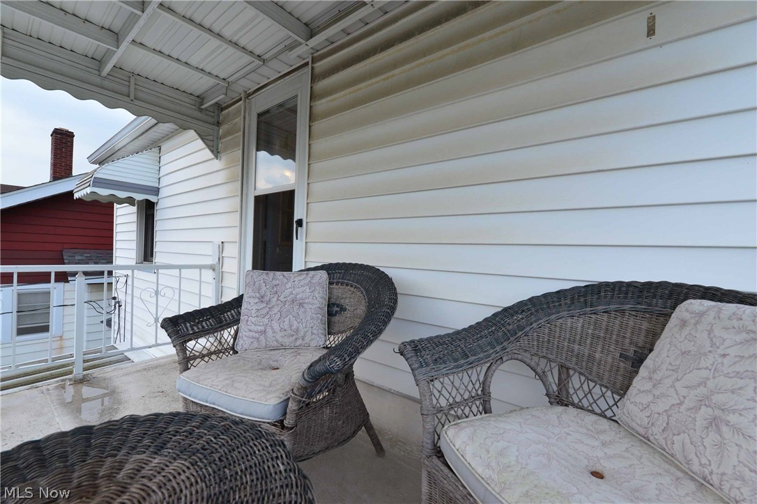 7914 Jameson Road Parma, OH 44129 - Photo 35 of 35 2nd floor covered porch -the perfect reading nook!