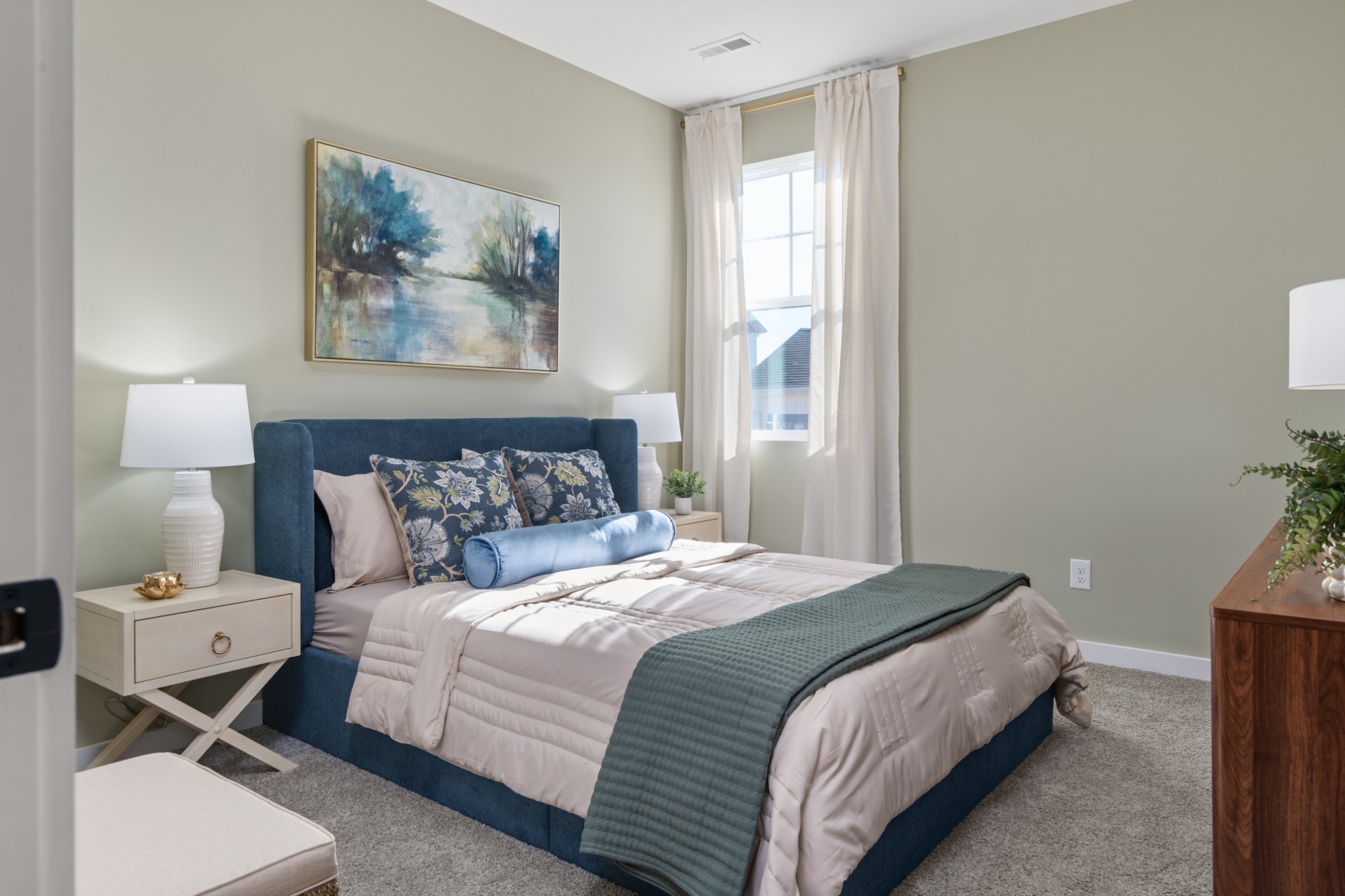 199 Reece Road Baxter, TN 38544 - Photo 11 of 13 a bedroom with a bed and wooden floor