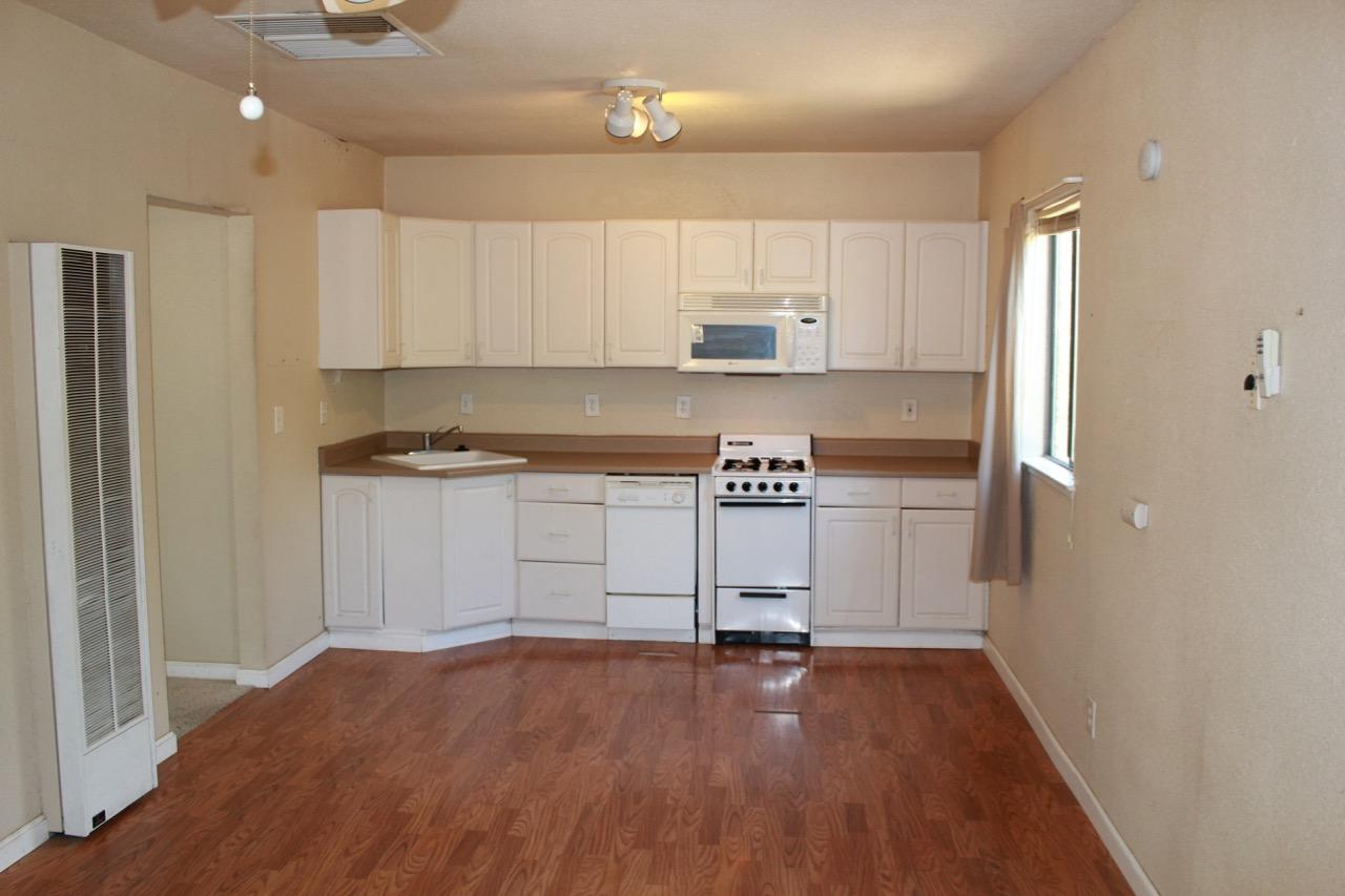19819 Reeds Creek Road Red Bluff, CA 96080 - Photo 12 of 18 a view of a kitchen with electric appliances