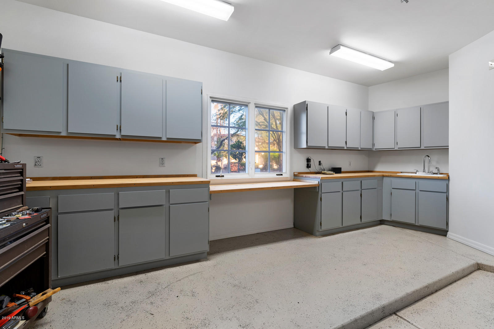 700 North Dobson Road, Unit 23 Chandler, AZ 85224 - Photo 30 of 47 32_32_Workshop_Cabinets_mls