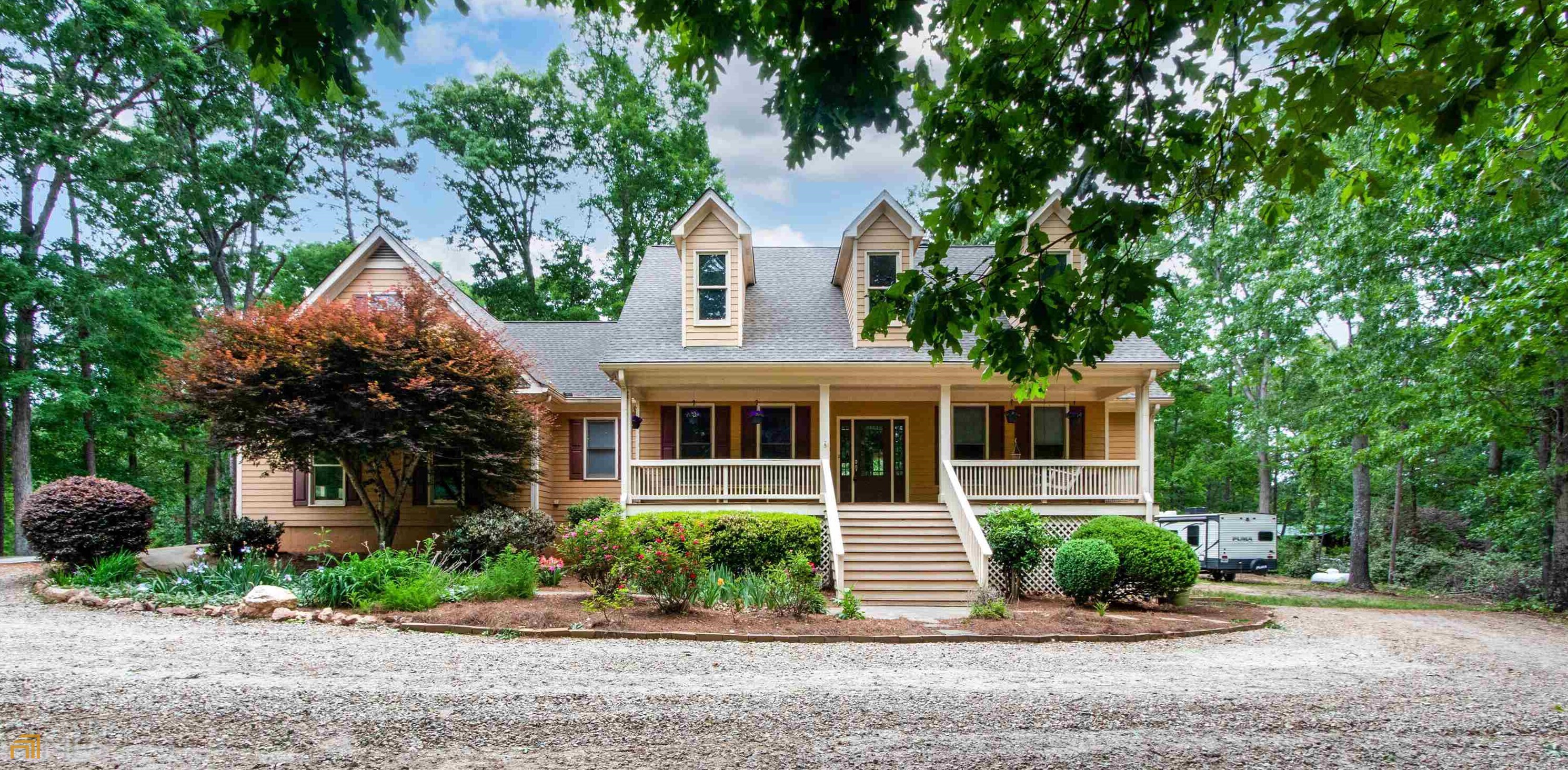 1100 John Deere Road Northwest Monroe, GA 30656 - Photo 1 of 1 front view of house with a yard
