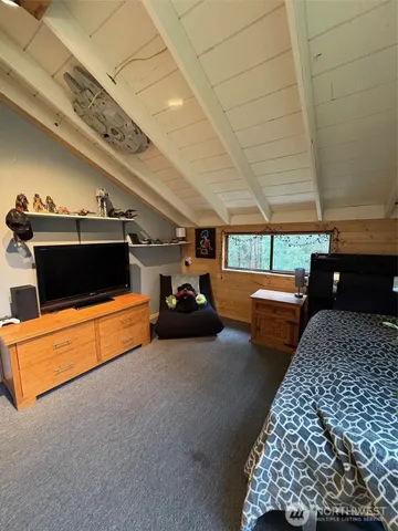 a living room with furniture pool and a table
