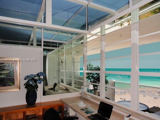 100 Lincoln Road, Unit 1642 Miami Beach, FL 33139 - Photo 11 of 56 a room with furniture and a potted plant