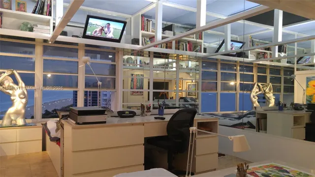 a view of a building with sitting area