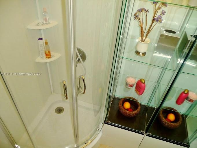 100 Lincoln Road, Unit 1642 Miami Beach, FL 33139 - Photo 18 of 56 a bathroom with a shower and a sink
