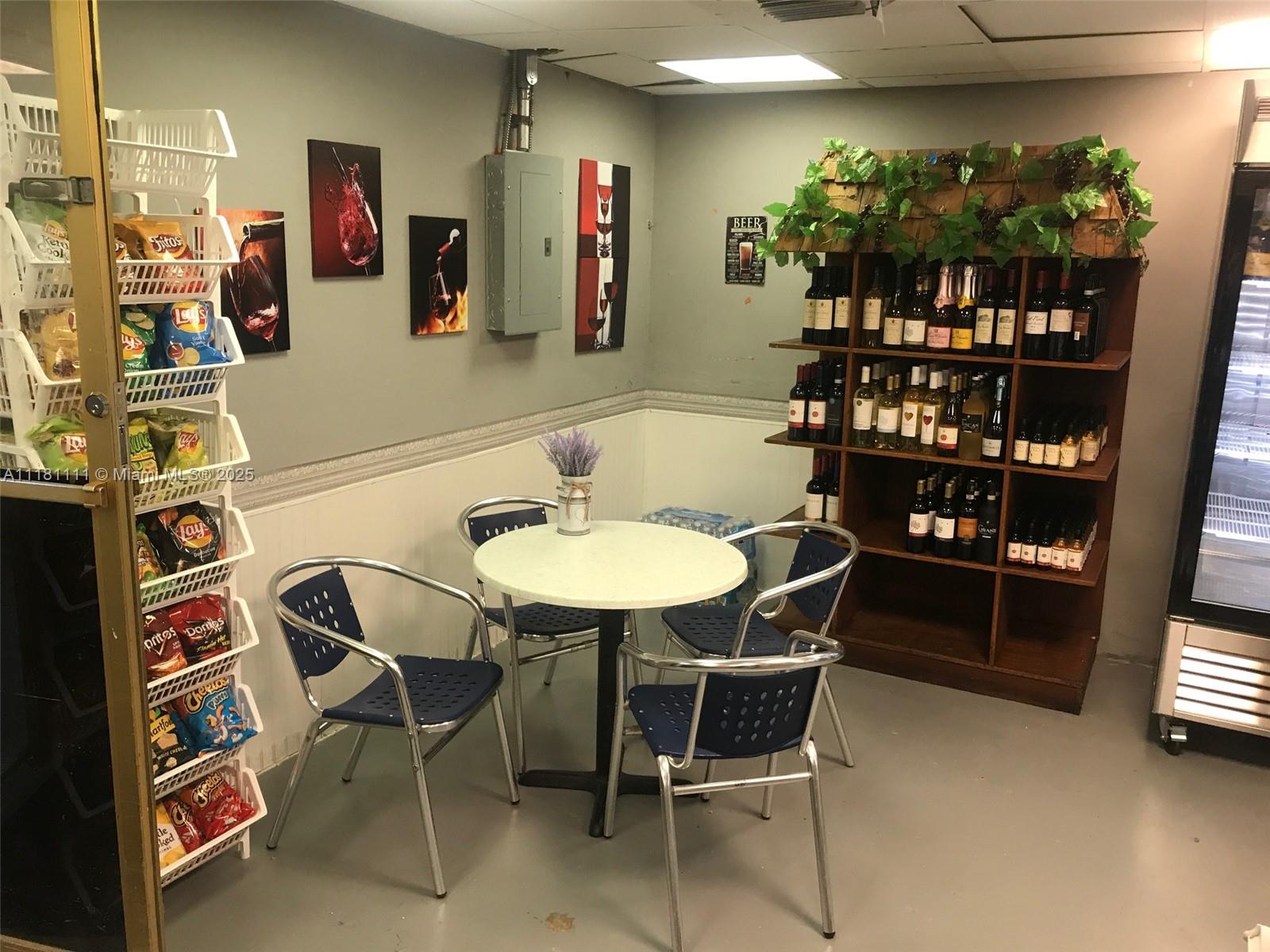 100 Lincoln Road, Unit 1642 Miami Beach, FL 33139 - Photo 37 of 56 a view of a dining room with furniture and chandelier