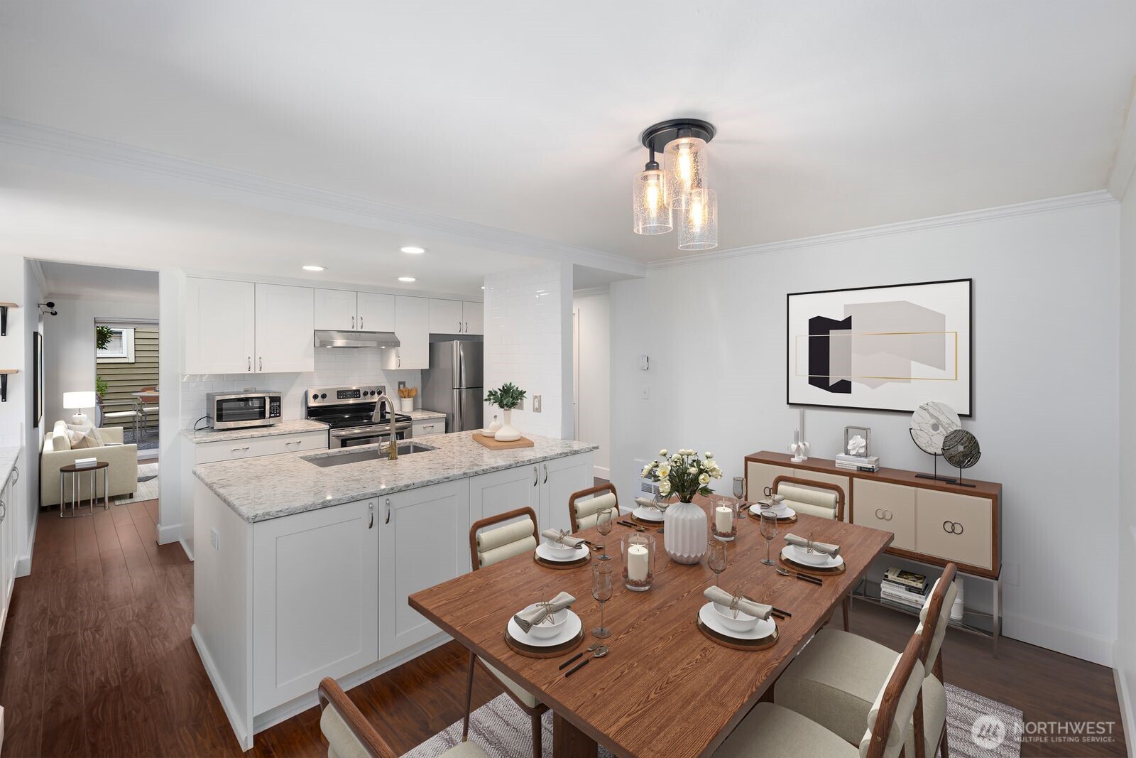 3901 Fremont Avenue North, Unit 202 Seattle, WA 98103 - Photo 8 of 23 a view of kitchen with sink dining table and chairs