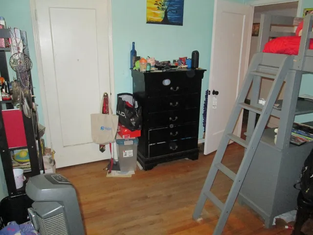 a room with furniture and a flat screen tv