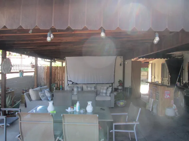 a kitchen with a table and chairs in it