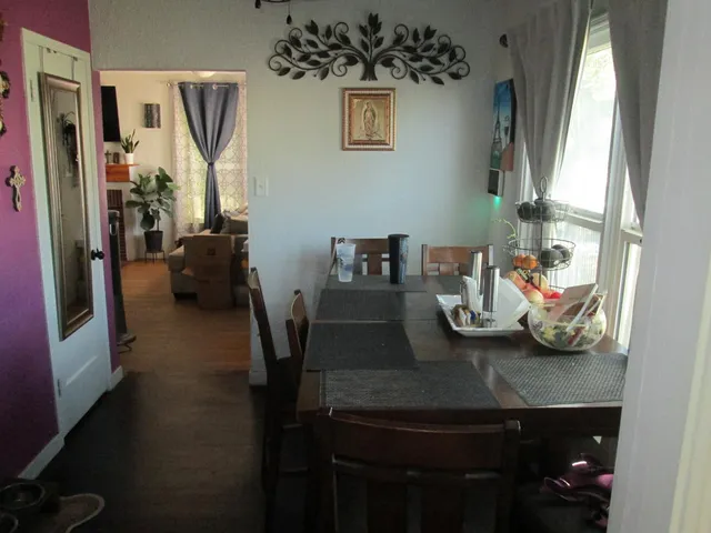 a view of a dining room with furniture
