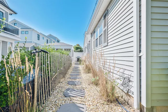 a view of a house with a door and wooden floor