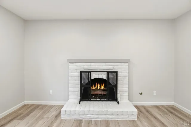 a living room with a fireplace