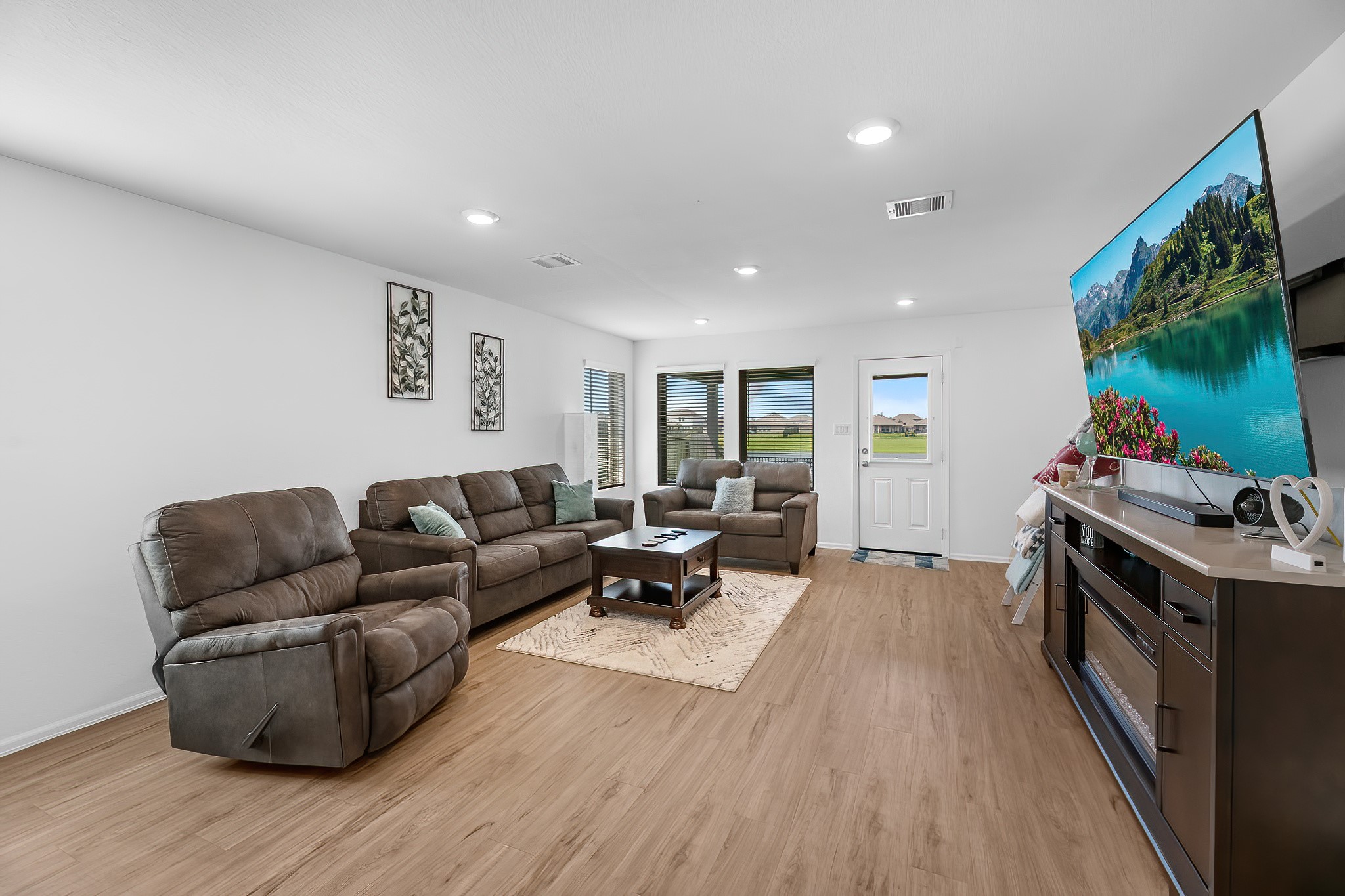 444 Maple Bend Lane La Marque, TX 77568 - Photo 12 of 32 a living room with furniture and a flat screen tv