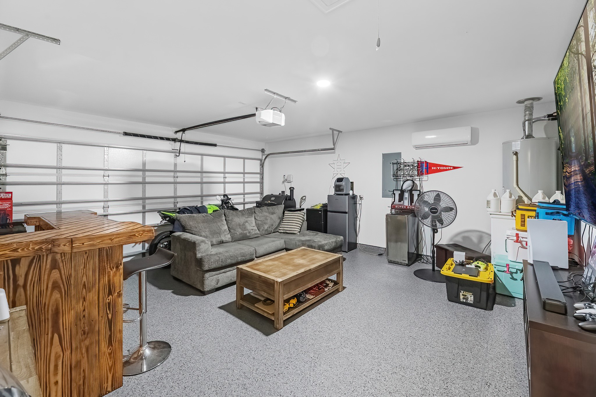 444 Maple Bend Lane La Marque, TX 77568 - Photo 27 of 32 a living room with furniture and a flat screen tv